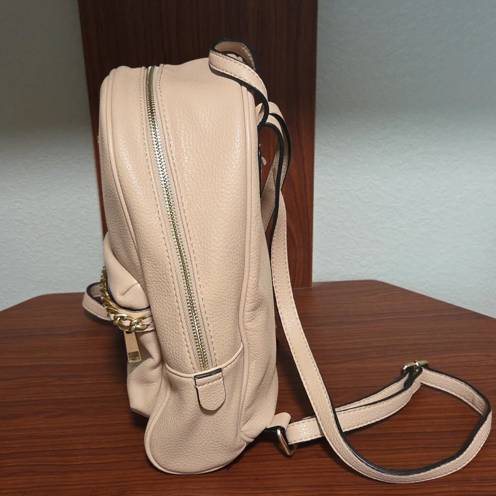 Elegant Light Pink Backpack with Gold Accents